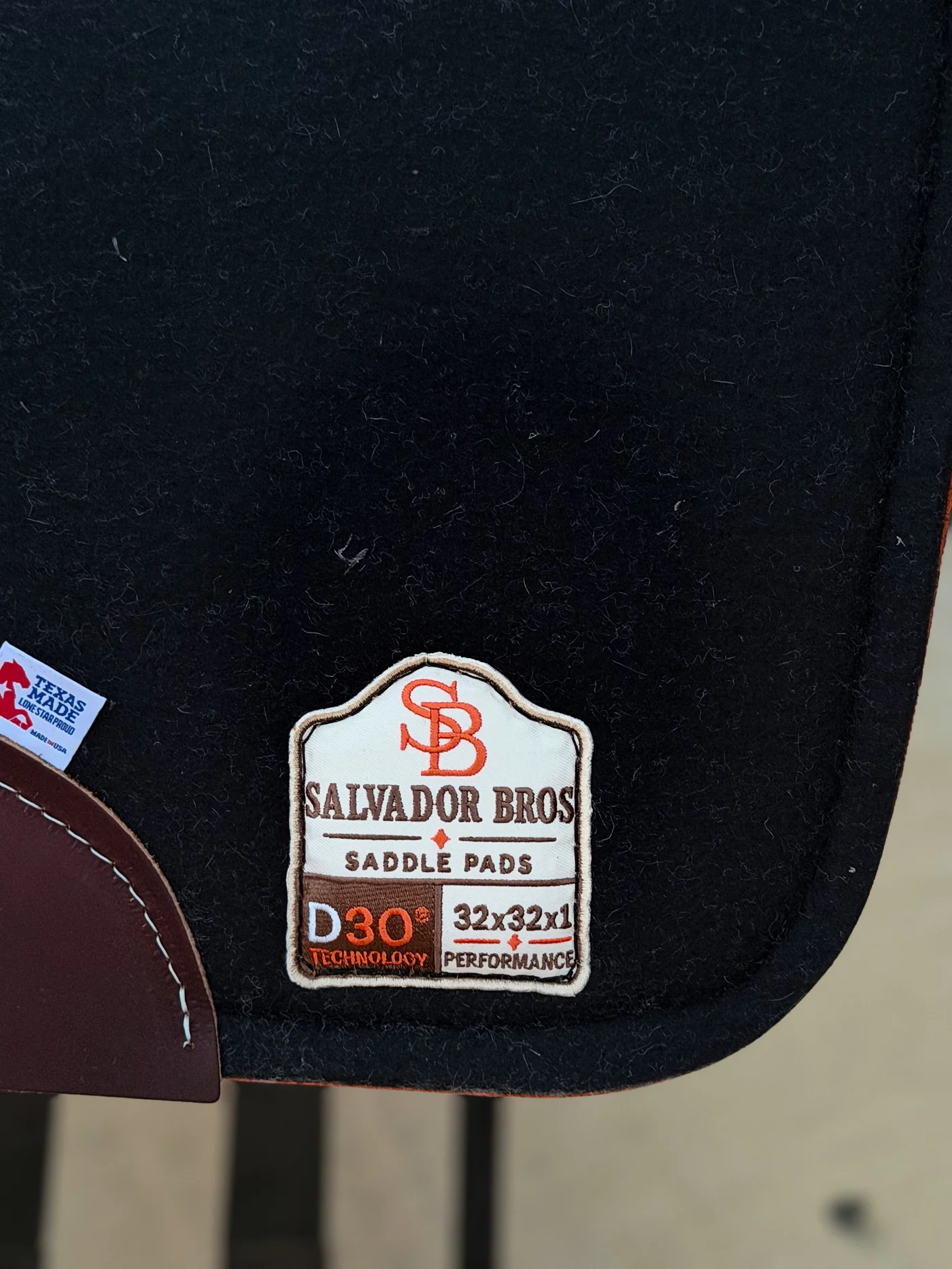 The Salvador Bros badge stitched into the pad binding.